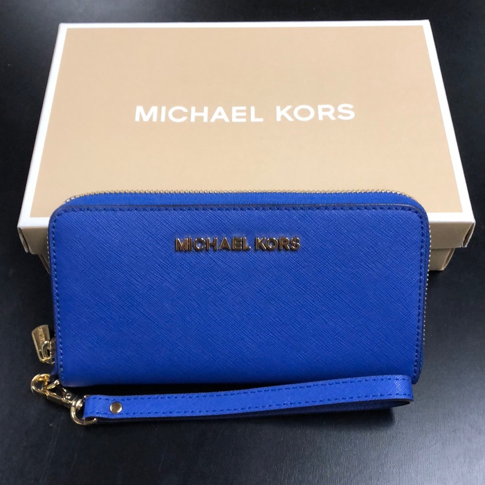 Michael Kors electric blue wristlet/wallet.